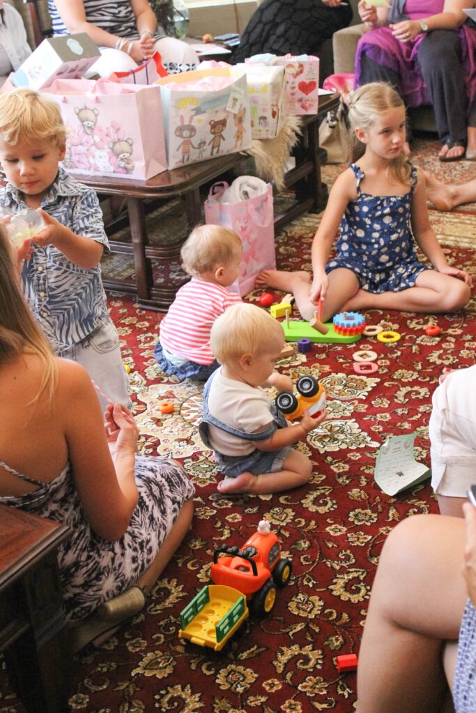 Kids playing at a baby sprinkle