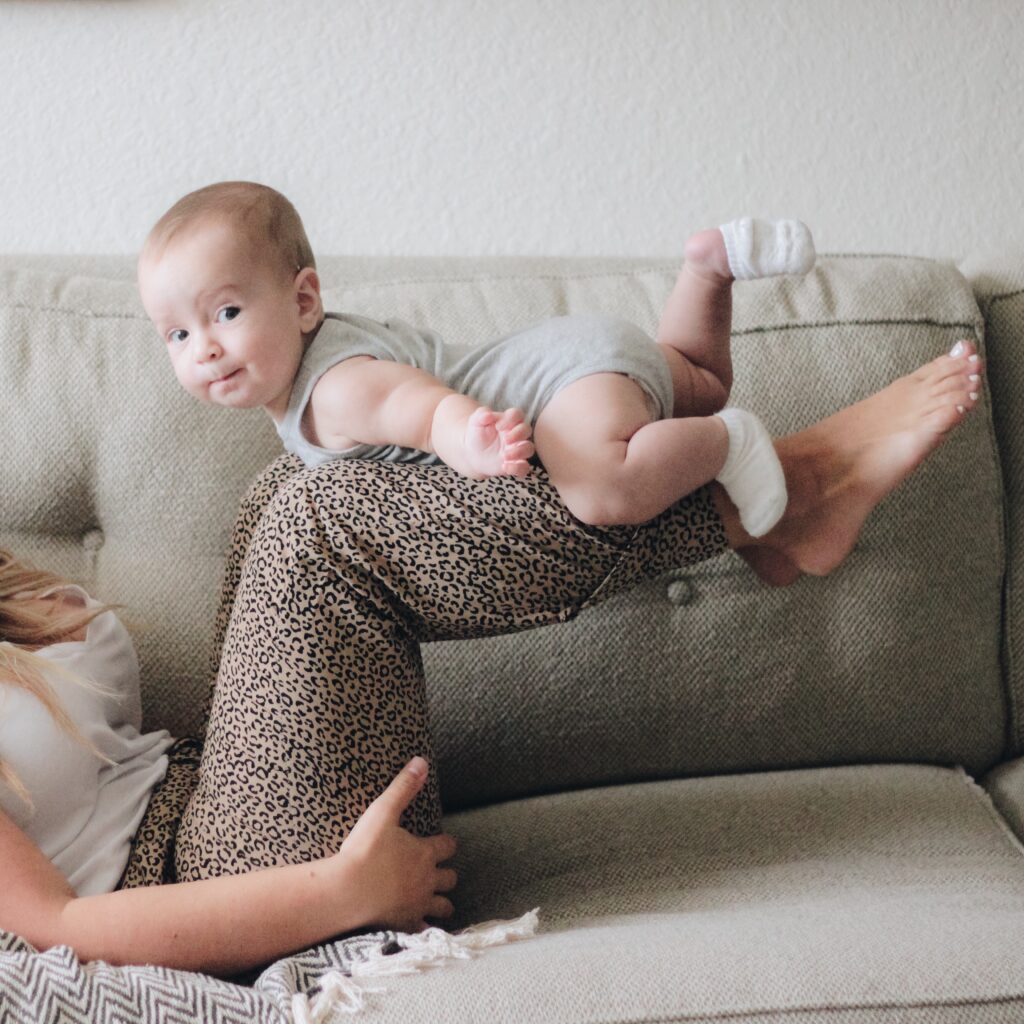 Strong Elegant Female Names with a baby girl on her moms legs