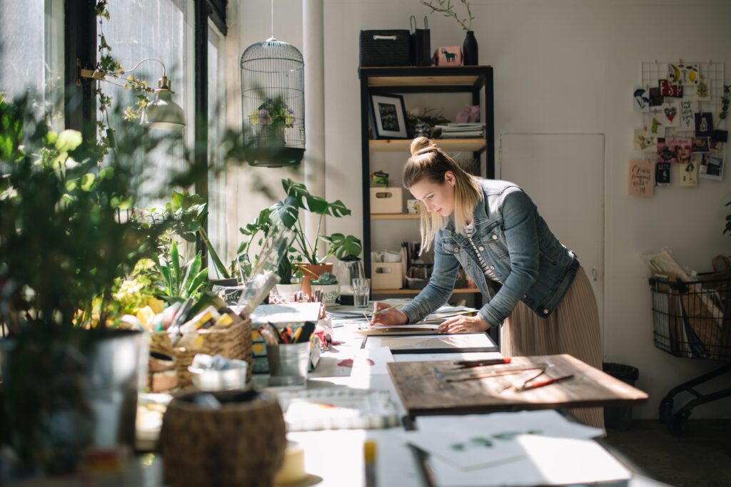 artist-working-in-modern-studio - Do Things That Make You Happy