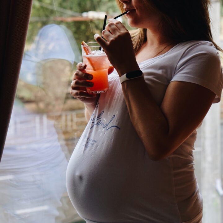 Pregnant woman drinking