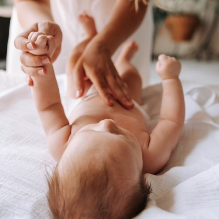 baby-mother-hand-touching