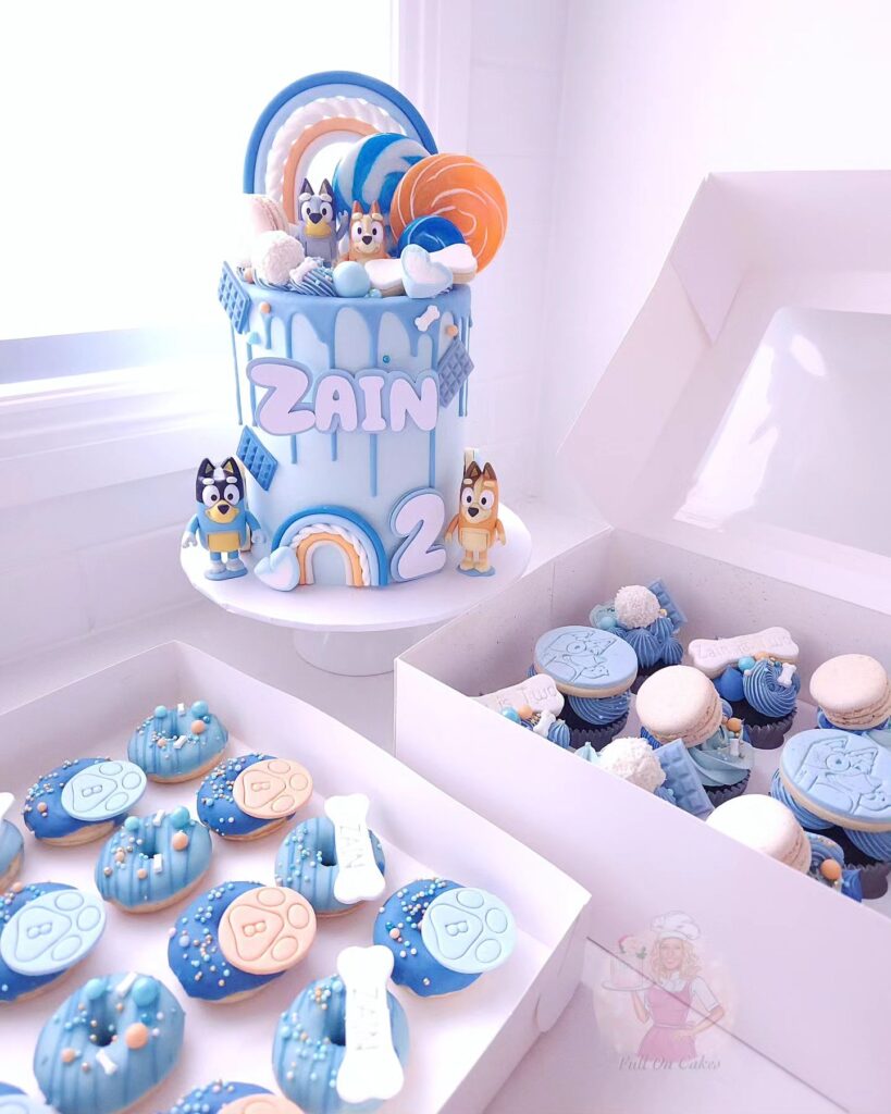 Bluey-inspired tall birthday cake and sweet treats