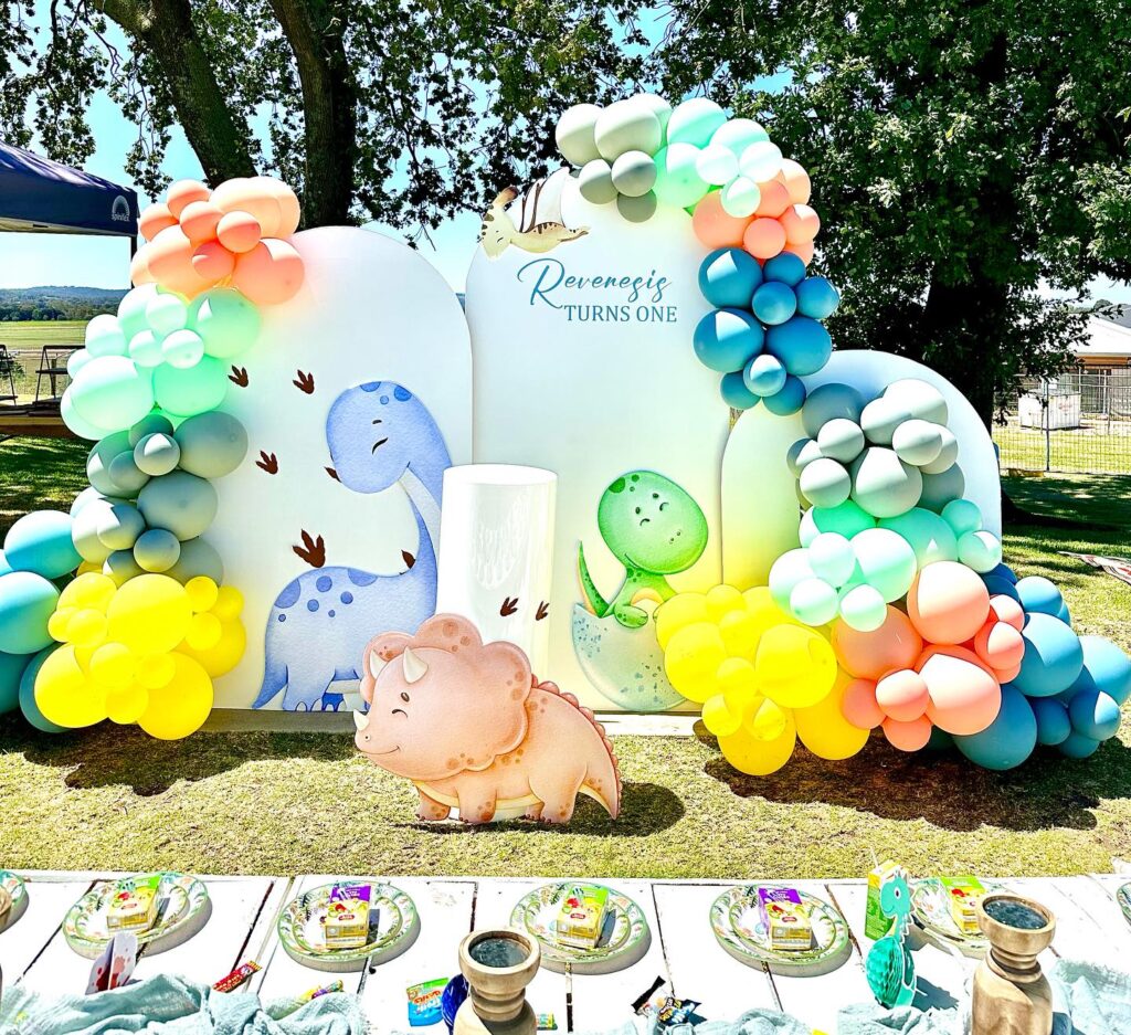 Cute and vibrant dinosaur first birthday theme and decorations
