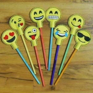 DIY felt smiley pencil toppers